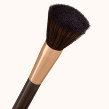 Load image into Gallery viewer, Fluffy flat shaped face makeup brush with a dark brown lacquered handle and a rose gold ferrule, made by mixing handmade synthetic dark brown bristles with a few strands of white bristles.
